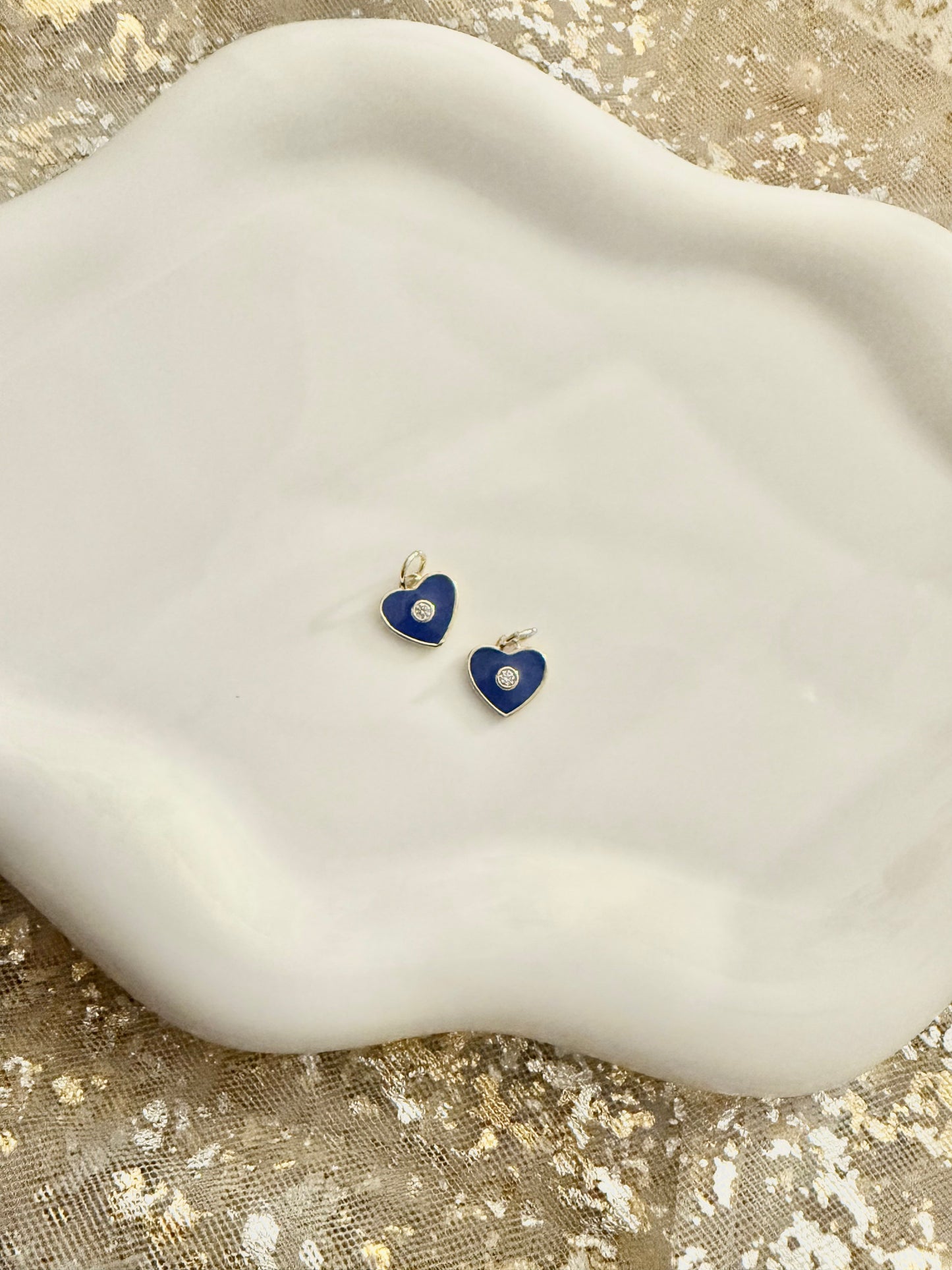 Protected heart charm