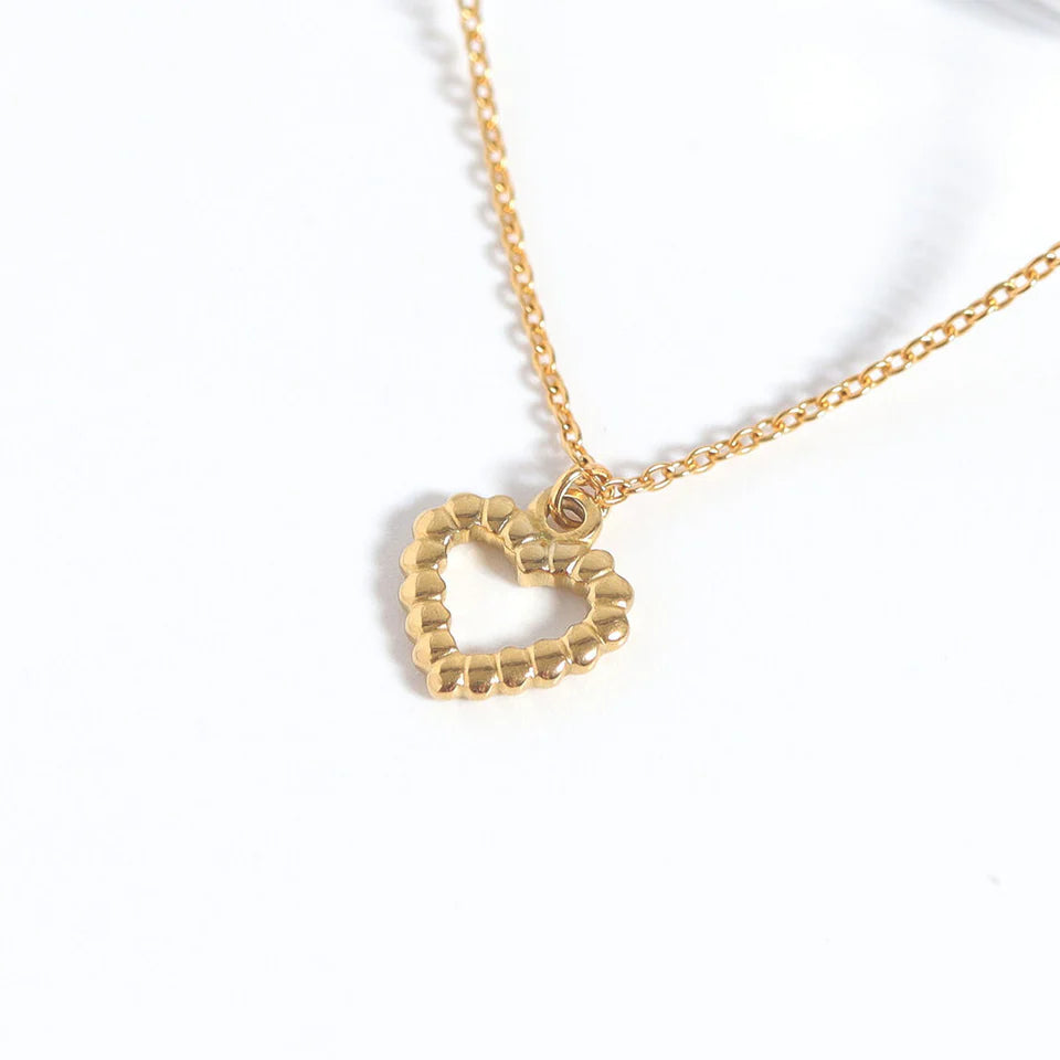 Textured heart charm