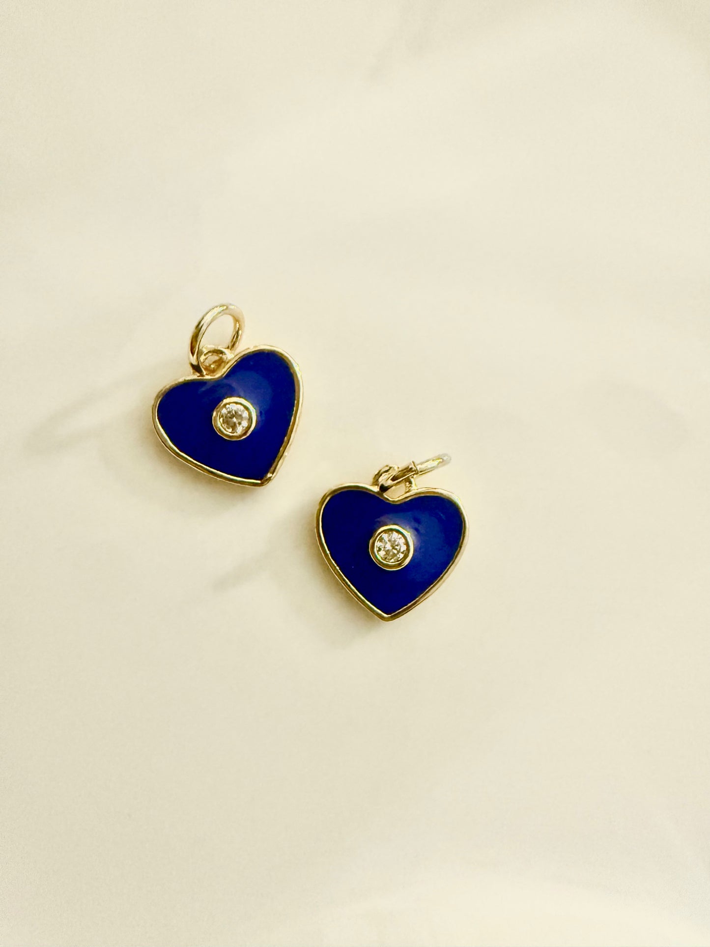 Protected heart charm
